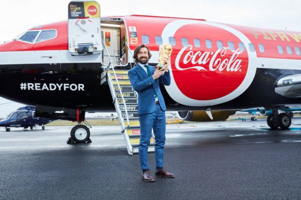 World Cup legend Pirlo with the trophy before leaving London World Cup legend Pirlo with the trophy before leaving London