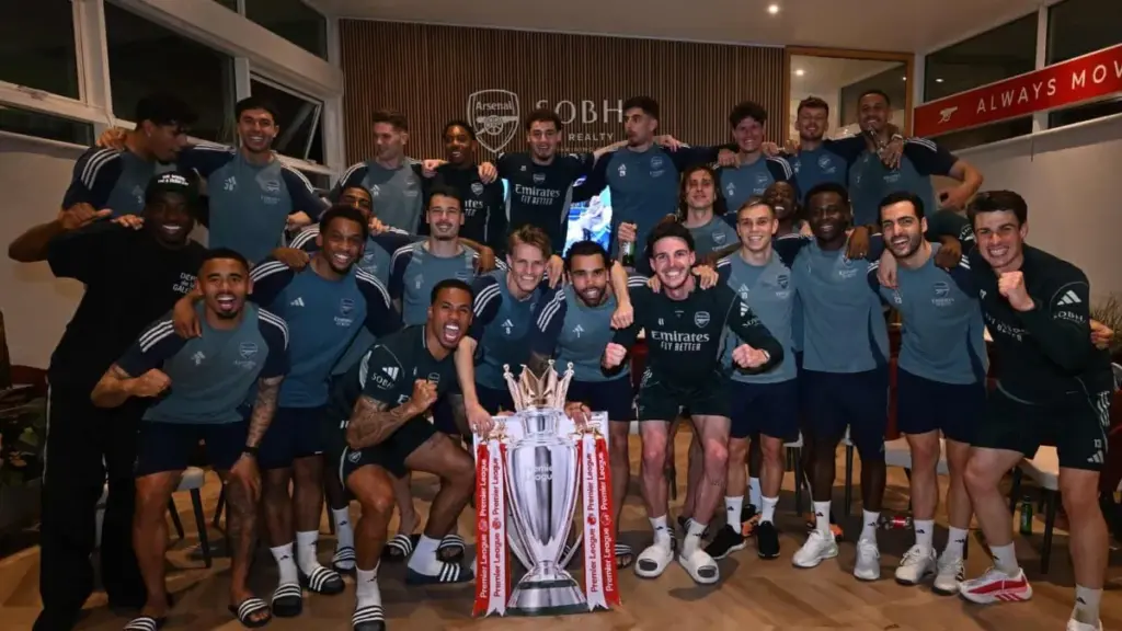 Arsenal Crowned Premier League Champions for First Time in 22 Years – The Wait is Over! 2 Dramatic Arsenal Premier League champions celebration - Mikel Arteta lifting the trophy, Bukayo Saka and Martin Ødegaard jumping with joy